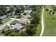 Aerial view of a charming single-Gathering home situated on a golf course community at 550 Eagle Dr, Daytona Beach, FL 32117