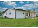 Spacious backyard patio with comfortable seating, perfect for relaxation and outdoor enjoyment at 550 Eagle Dr, Daytona Beach, FL 32117