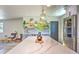 Island in renovated kitchen offering quartz counters and seating, and gray cabinets at 550 Eagle Dr, Daytona Beach, FL 32117