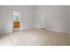 Neutral bedroom with tile flooring and an en-suite bathroom featuring a vanity at 5559 Pats Pt, Winter Park, FL 32792