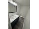 Contemporary bathroom with updated vanity, fixtures, and toilet at 5930 Village Cir # Ge, Orlando, FL 32822