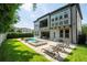 Lush backyard offering a pool, comfortable lounge area, and serene garden views at 682 Canopy Estates Dr, Winter Garden, FL 34787