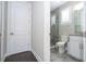 Well-lit bathroom with glass-enclosed shower, granite countertop, and modern fixtures at 682 Canopy Estates Dr, Winter Garden, FL 34787