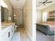 An elegant bathroom with granite countertops, tile flooring, and walk in shower with grey ceramic tile at 682 Canopy Estates Dr, Winter Garden, FL 34787