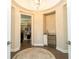 The dressing area is accented by a chandelier, wet bar and leads to a large walk-in closet at 682 Canopy Estates Dr, Winter Garden, FL 34787