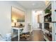 Flex space with desk, decor, and a view to the nearby wet bar with sink at 682 Canopy Estates Dr, Winter Garden, FL 34787