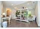 Flex space with dividing bookshelves and a view of a desk and the outdoor view at 682 Canopy Estates Dr, Winter Garden, FL 34787