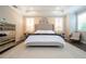 The main bedroom boasts natural light, plantation shutters, a ceiling fan, and elegant neutral decor at 682 Canopy Estates Dr, Winter Garden, FL 34787