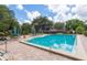 Inviting pool area featuring ample seating and a clear blue swimming pool at 700 Melrose Ave # C22, Winter Park, FL 32789