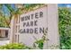 Winter Park Garden community sign with decorative foliage and clear signage at 700 Melrose Ave # C22, Winter Park, FL 32789