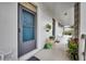 Cozy entryway with charming decor, plants, and a welcoming ambiance at 700 Melrose Ave # C22, Winter Park, FL 32789