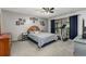 Main bedroom featuring carpet, sliding glass doors to pool, and neutral walls with matching decor at 985 Willow Run Ln, Winter Springs, FL 32708