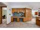 Spacious office area features custom built in cabinets with countertop, offering ample storage and workspace at 985 Willow Run Ln, Winter Springs, FL 32708