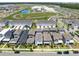 Overhead view of a residential neighborhood with modern homes, green spaces, and community amenities at 10322 Marconi Ave, Orlando, FL 32827