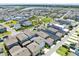 Aerial view of a well-planned community with lush greenery and recreational areas at 10322 Marconi Ave, Orlando, FL 32827