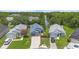 Aerial view of the home in a community near a scenic waterway at 104 Yorktown Pl, Sanford, FL 32771