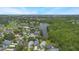 Expansive view of neighborhood and lake with abundant greenery at 104 Yorktown Pl, Sanford, FL 32771