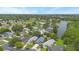 Peaceful neighborhood by a lake with scenic winding roads lined by trees at 104 Yorktown Pl, Sanford, FL 32771
