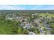 An aerial view of a neighborhood and its proximity to community amenities at 104 Yorktown Pl, Sanford, FL 32771