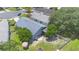 Overhead aerial view of the backyard with a firepit, patio furniture and a fenced yard at 104 Yorktown Pl, Sanford, FL 32771