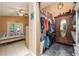 Walk-in closet with a mirror and wardrobe, conveniently adjacent to the bedroom at 104 Yorktown Pl, Sanford, FL 32771