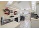 Well-equipped kitchen featuring tile floors, a breakfast nook, and ample counter space at 104 Yorktown Pl, Sanford, FL 32771
