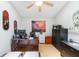 Home office featuring a large desk, modern computer, and a comfortable chair at 104 Yorktown Pl, Sanford, FL 32771