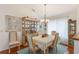 Formal dining room with large windows and hardwood floors at 109 Hunter Point Ct, Debary, FL 32713