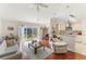 Comfortable living room open to the kitchen and backyard at 109 Hunter Point Ct, Debary, FL 32713