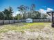 Well-maintained backyard with a storage shed and wooden fence, offering a private outdoor space at 1276 Comerwood Dr, Deltona, FL 32738