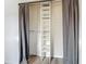 Walk-in closet features built-in shelving system and ample storage space at 1276 Comerwood Dr, Deltona, FL 32738