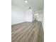 Bright bedroom featuring luxury vinyl plank flooring and white walls at 13512 Turtle Marsh Loop # 729, Orlando, FL 32837