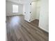 Bright bedroom featuring new floors and a closet for a modern look at 13512 Turtle Marsh Loop # 729, Orlando, FL 32837