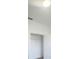A walk-in closet with open doors and wire shelving at 13512 Turtle Marsh Loop # 729, Orlando, FL 32837