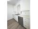 Kitchen featuring stainless steel dishwasher and sink with plenty of counter space at 13512 Turtle Marsh Loop # 729, Orlando, FL 32837