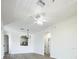 Bright living room featuring new floors and neutral paint for a modern look at 13512 Turtle Marsh Loop # 729, Orlando, FL 32837