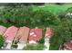 An elevated view of homes with a golf course in the background at 1364 Augusta National Blvd, Winter Springs, FL 32708