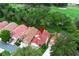An elevated view of homes with a golf course in the background at 1364 Augusta National Blvd, Winter Springs, FL 32708