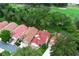An elevated view of homes with a golf course in the background at 1364 Augusta National Blvd, Winter Springs, FL 32708