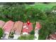 An elevated view of homes with a golf course in the background at 1364 Augusta National Blvd, Winter Springs, FL 32708