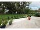 Serene backyard showcasing lush greenery and beautiful landscaping at 1364 Augusta National Blvd, Winter Springs, FL 32708