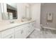 Bathroom features a double vanity with modern mirrors and fixtures at 1364 Augusta National Blvd, Winter Springs, FL 32708
