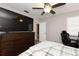Bedroom featuring a ceiling fan, carpet, and a large dresser at 1364 Augusta National Blvd, Winter Springs, FL 32708