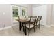 Cozy dining area with sliding doors to the outdoor space at 1364 Augusta National Blvd, Winter Springs, FL 32708