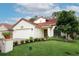 Inviting home boasting a well-kept lawn and appealing curb appeal at 1364 Augusta National Blvd, Winter Springs, FL 32708