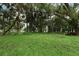 Beautiful vacant land surrounded by mature trees ready for new construction at 1364 Augusta National Blvd, Winter Springs, FL 32708