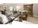 Cozy living room with stylish decor, tile floors, and elegant furnishings at 1364 Augusta National Blvd, Winter Springs, FL 32708