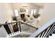 Sun-filled living room featuring a fireplace, large windows, and an open floor plan to the dining area at 1364 Augusta National Blvd, Winter Springs, FL 32708