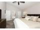 Bright main bedroom with ensuite bathroom entrances at 1364 Augusta National Blvd, Winter Springs, FL 32708