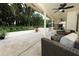 Enjoyable patio area with outdoor seating and picturesque views of the well-maintained backyard at 1364 Augusta National Blvd, Winter Springs, FL 32708